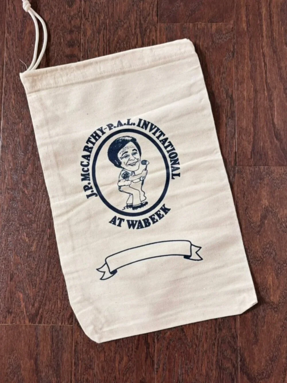 Vintage drawstring bag reads J.P. McCARTHY-P.A.L. INVITATIONAL AT WABEEK